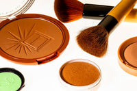 brown and black makeup brush
